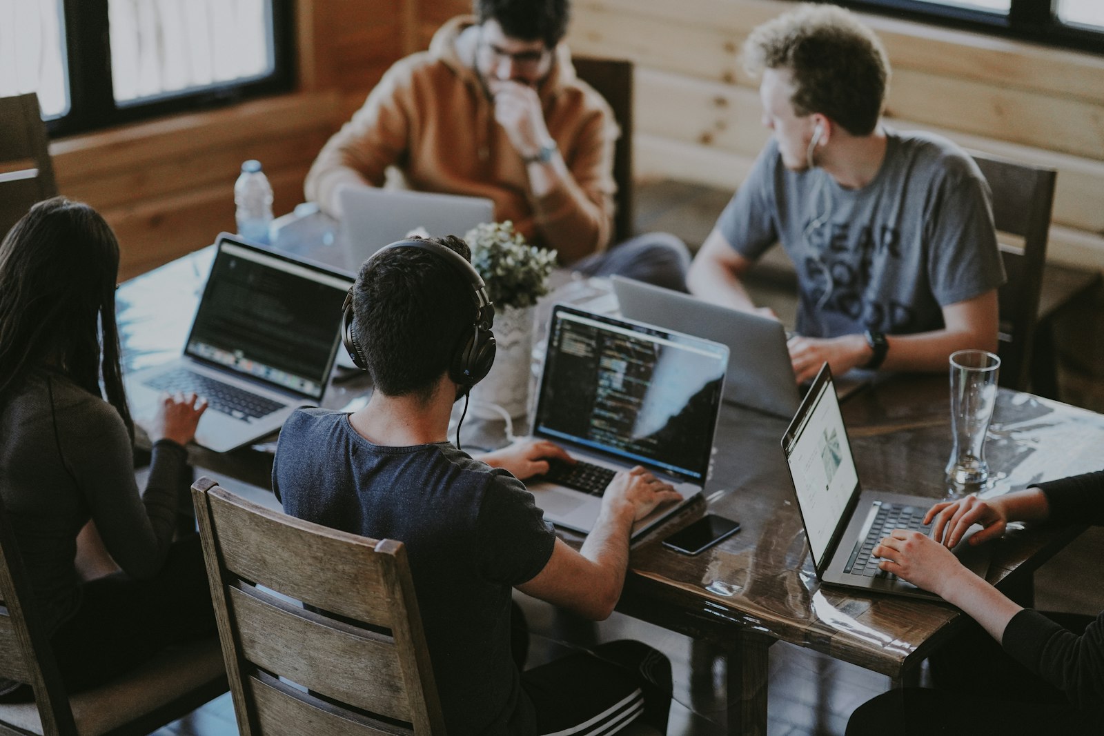 Professional team collaborating on business strategy in modern office